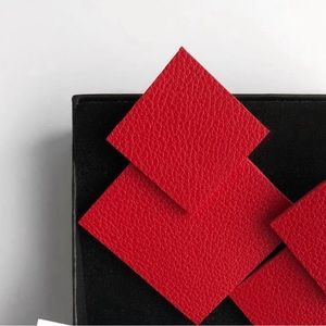 very fashionable leather earrings